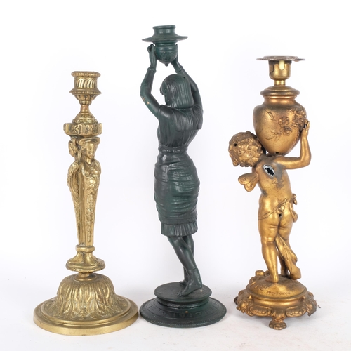 291 - Antique cast-brass candle, supported by the Three Graces, 33cm, an Egyptian style candlestick, and a... 