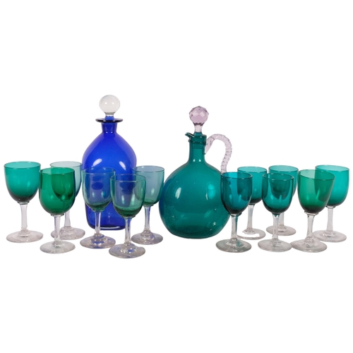 295 - A Bristol blue decanter with stopper, 24cm, a green glass Claret jug, and 12 green wine glasses