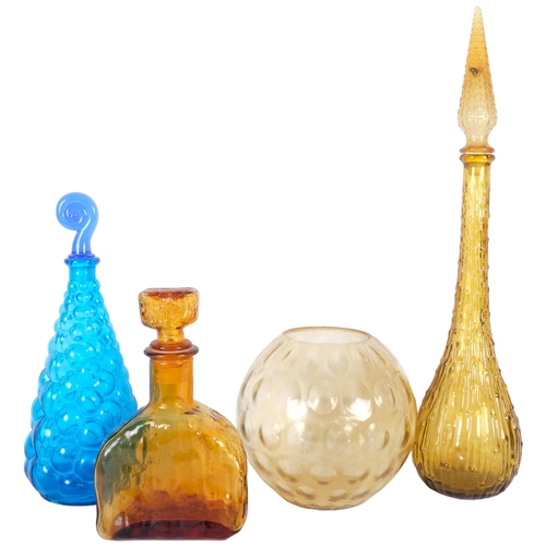 300 - A 1960s moulded amber glass decanter and stopper, 55cm, 2 smaller decanters, and an Art glass bowl