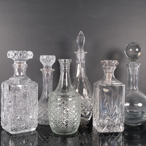 302 - A group of 6 glass decanters, 5 with stoppers, tallest 34cm