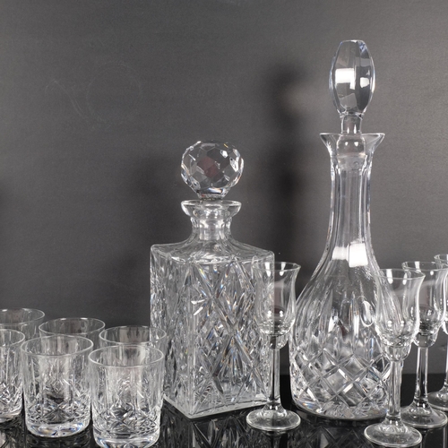 304 - 3 cut-crystal decanters and stoppers, tallest 36cm, 6 Whisky tumblers, and 4 liqueur glasses