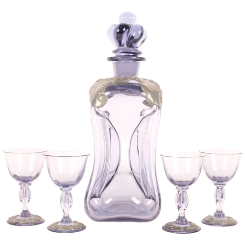 313 - Holmegaard, a 1920s Danish Kluck Kluck for Kuttrolf amethyst decanter with applied pewter decoration... 