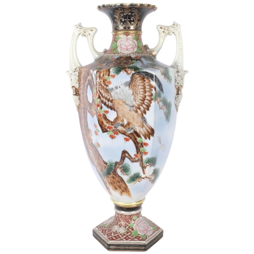 386 - A Japanese hexagonal porcelain vase, with painted design of an eagle in a tree and squirrel, 54.5cm