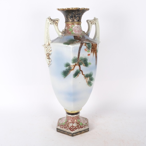 386 - A Japanese hexagonal porcelain vase, with painted design of an eagle in a tree and squirrel, 54.5cm