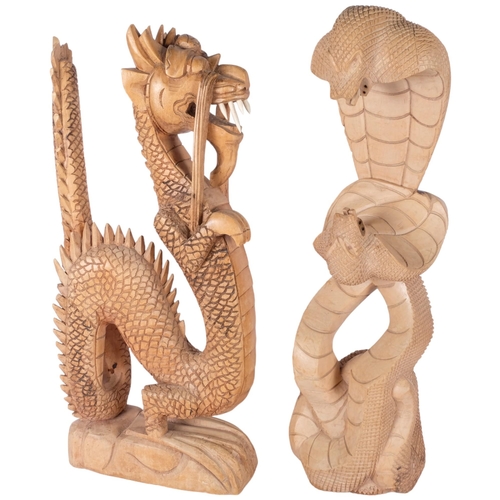 387 - 2 large carved wood figures, depicting a dragon and a cobra, H66cm