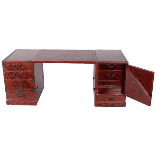 397 - A Japanese red lacquered table top jewellery/travelling chest, converting to miniature desk, with fi... 