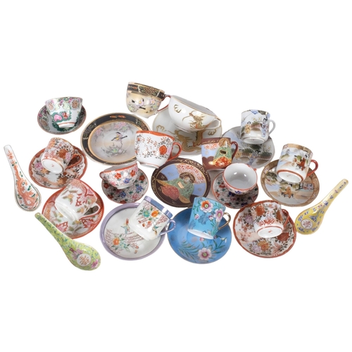 405 - A group of Oriental porcelain decorative cups and saucers, etc