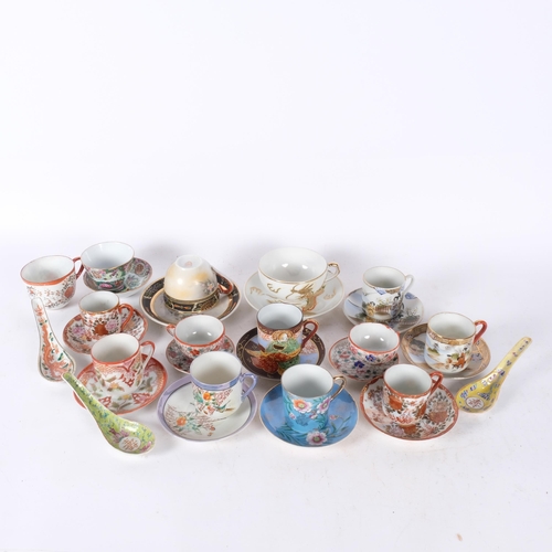 405 - A group of Oriental porcelain decorative cups and saucers, etc