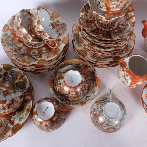 410 - A quantity of Vintage Japanese porcelain teaware, in 2 designs, including a tea kettle