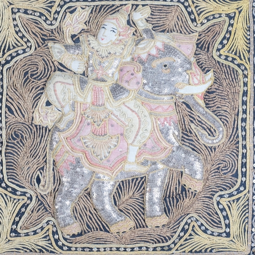 521 - A large Burmese Kalaga embroidery, female figure on an elephant, framed, 52cm x 52cm, and a second B... 