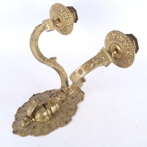 522 - A large heavy gilt-metal double wall sconce, with bearded man decoration, H38cm