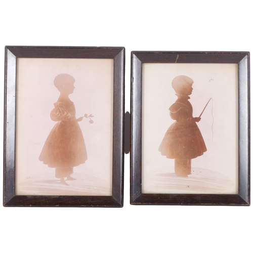 529 - 2 Antique silhouette portraits, framed, 1 of a little girl with a flower, inscription on the reverse... 