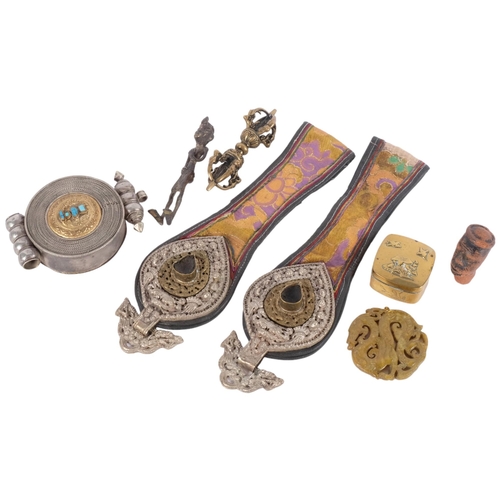 530 - A quantity of Tibetan ceremonial items, including turquoise set Ga'u, a pair of chatelaine or belt o... 