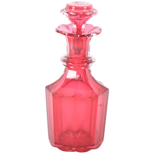 533 - A Victorian cranberry glass decanter, with associated stopper, H23cm