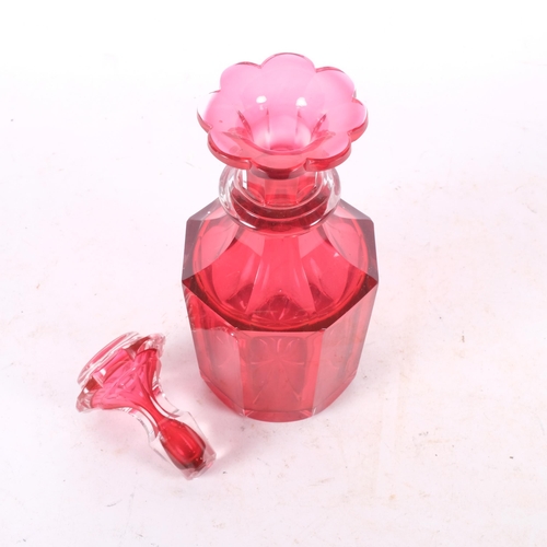 533 - A Victorian cranberry glass decanter, with associated stopper, H23cm