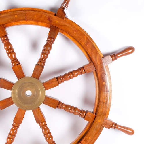 547 - A large reproduction ship's wheel, diameter approx 88cm