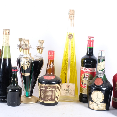 561 - A Vintage bottle of Tia Maria, Montarcy Calvados, Dom Benedictine liqueur, Framberry Dolfi liqueur, ... 