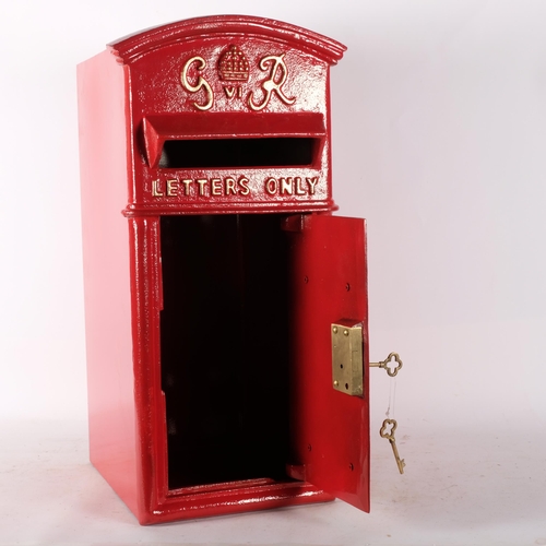 570 - A large cast-iron Royal Mail reproduction post box, H58cm, with key