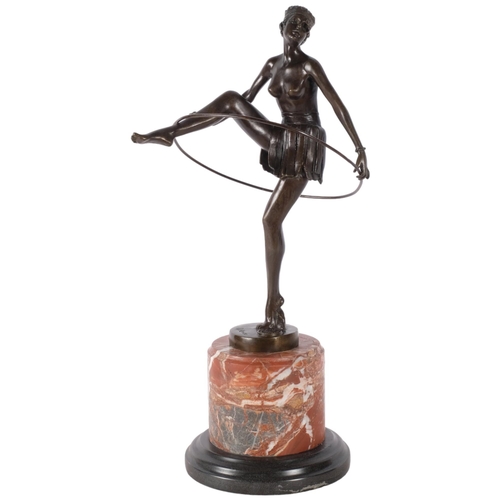 571 - An Art Deco style bronze study of a dancing figure, on marble stand, H47cm