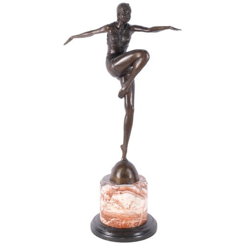 573 - An Art Deco style bronze study of a dancing figure, on marble stand, H56cm