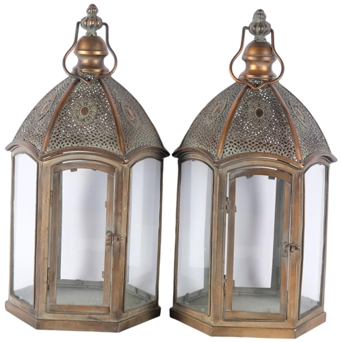 574 - A pair of copper lanterns with glass panels, H50cm