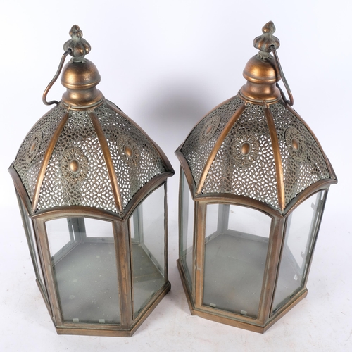 574 - A pair of copper lanterns with glass panels, H50cm