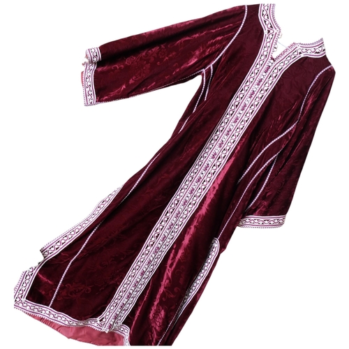 588 - A Moroccan red velvet caftan, with applied braided edging