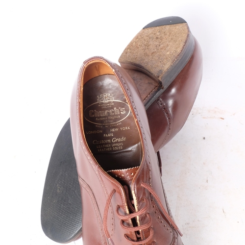 589 - A pair of gent's brown leather semi-brogue Oxford shoes, by Church's, leather uppers and leather sol... 