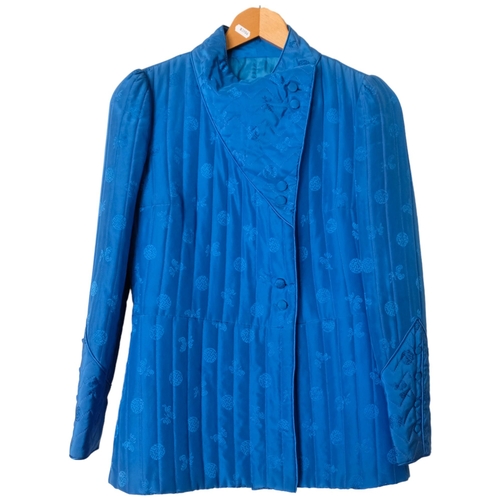 592 - EDDIE LAU - a lady's 100% blue silk jacket, size 14