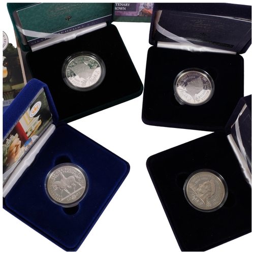 703 - 4 British Commemorative silver proof crowns' in original box and papers