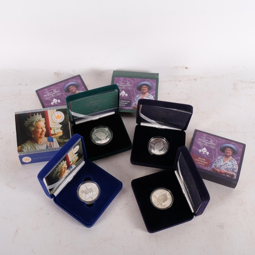 703 - 4 British Commemorative silver proof crowns' in original box and papers