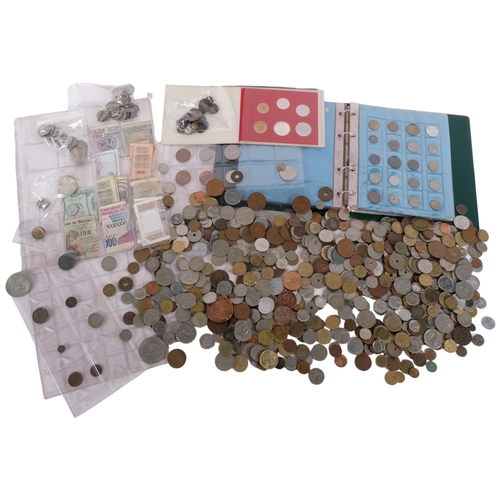 706 - A large quantity of foreign coins and banknotes