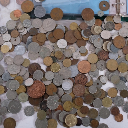 706 - A large quantity of foreign coins and banknotes