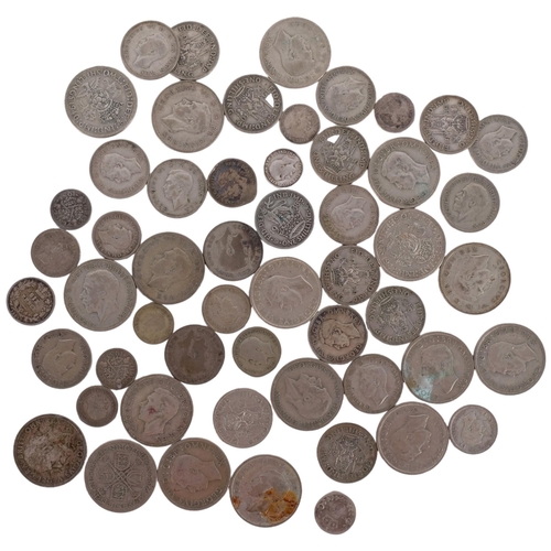 707 - A quantity of pre-1947 British silver coins, including florins, shillings etc, 11oz weighable