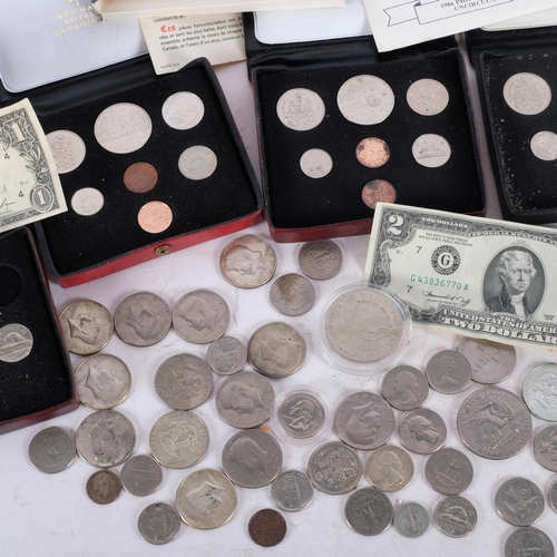 708 - A collection of American and Canadian presentation coins, banknotes etc, some cased