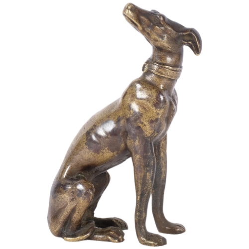 715 - A Victorian bronze model of a seated Greyhound, height approx 5