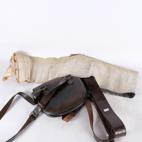 724 - A leather bus conductor's bag, a Vintage leather bus conductor's bag, associated belt and harness, a... 