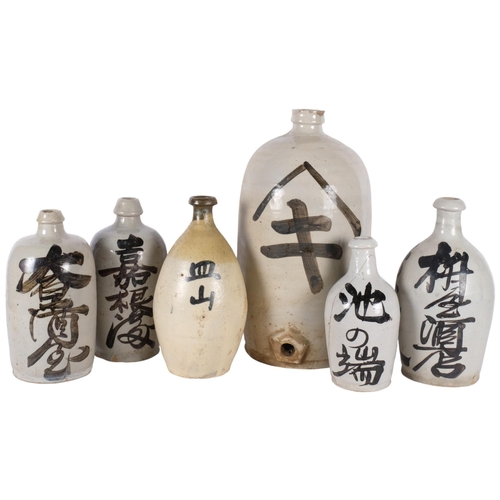 727 - A group of 6 Sake bottles, various sizes, largest 40cm