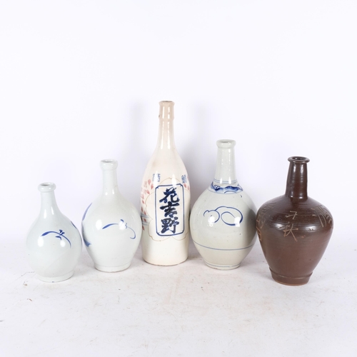 728 - A group of 5 Sake bottles and Oriental vases, various designs and sizes, largest height 38cm