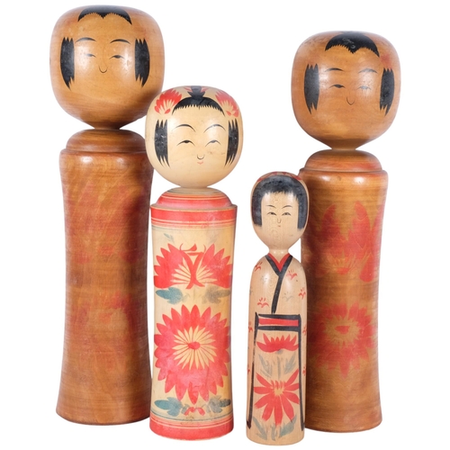 729 - A group of 4 Japanese Kokeshi dolls, largest height 49cm