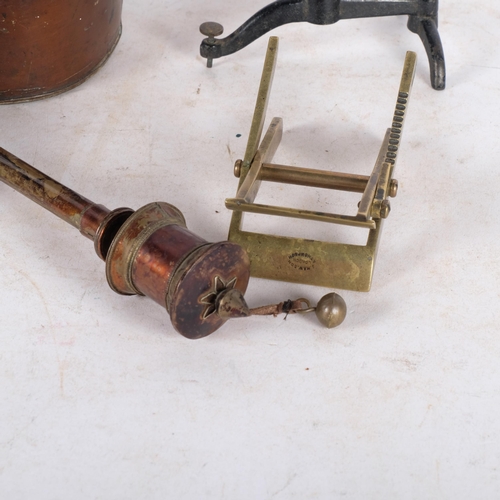 751 - A Victorian tin oil lamp with mirrored back, a brass letter scale, Maw & Sons brass paper holders, a... 