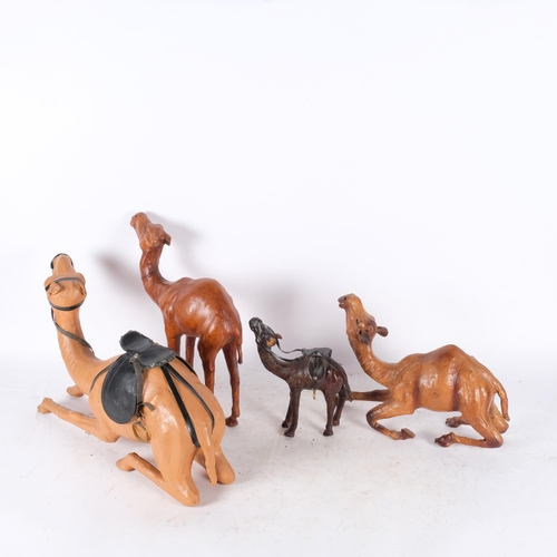 772 - A group of leather clad camels, longest 45cm (4)