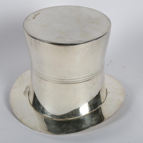 860 - A silver plated wine/champagne cooler, in the form of a top hat, H17.5cm