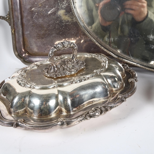 865 - A group of plated ware to include an oval galleried tea tray, W61cm, a rectangular 2-handled tea tra... 