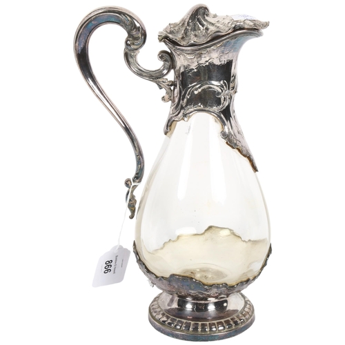 866 - A French Claret jug, with embossed silver plated mounts and clear glass body, impressed France to th... 