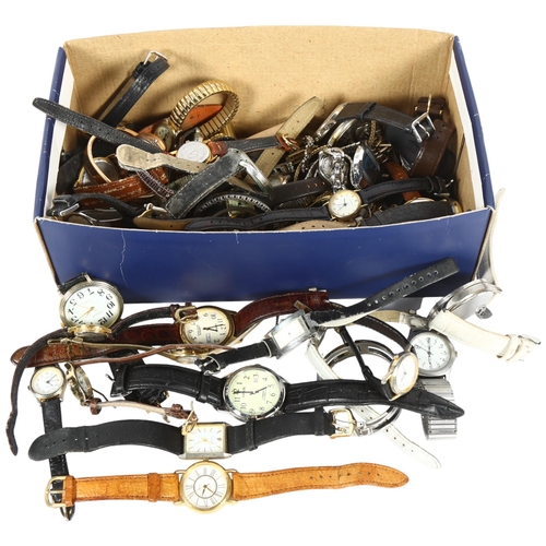 876 - A box of various quartz wristwatches (ladies and gents)