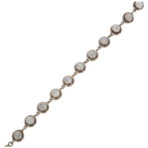 888 - A silver moonstone set panelled bracelet