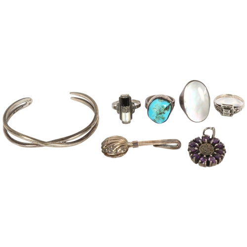 892 - A group of various silver jewellery, including a turquoise set ring, an opal set ring, bangle, penda... 