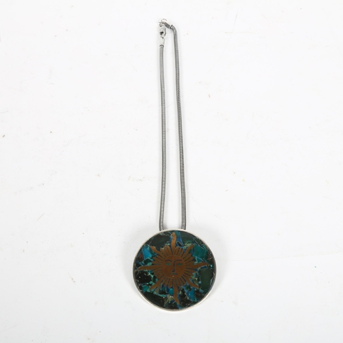 907 - ANTONIO TAXCO - a large Mexican brass and composite stone inlaid sterling silver sun pendant necklac... 