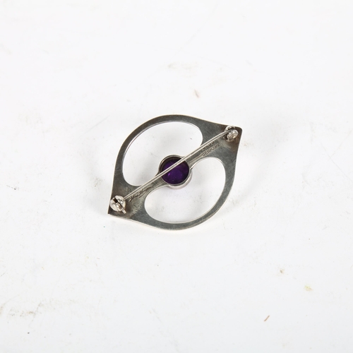 911 - HANS HANSEN - a Danish modernist sterling silver amethyst openwork eye brooch, 46.5mm, 13.3g